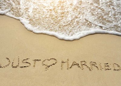 Just married written in sand on Florida beach